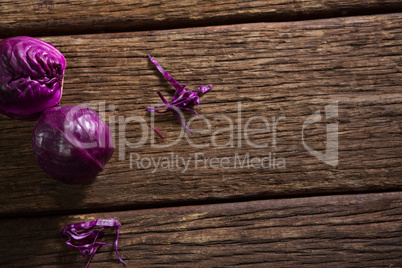 Red cabbage on wooden table