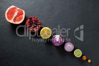 Overhead view of fruits and vegetables arranged