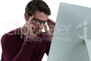 Stressed man sitting at desk