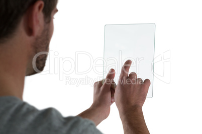 Man using glass digital tablet