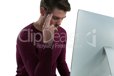 Man sleeping while using computer