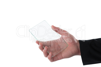 Cropped hand of businessman using interface