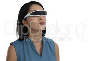 Female executive using virtual reality headset