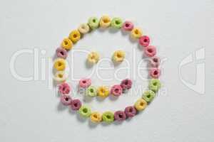 Froot loops forming a smiley face