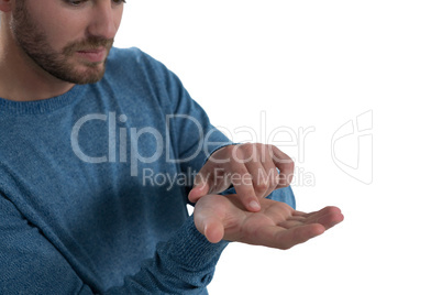 Man pretending to hold an invisible object