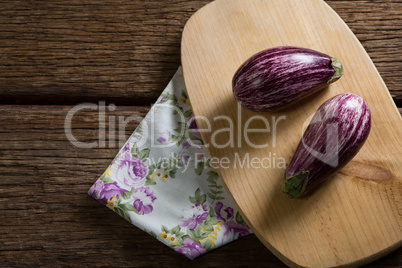 Eggplant on chopping board