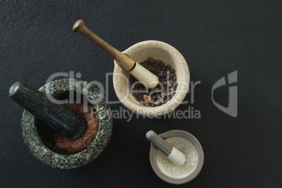 Sea salt and black salt in mortar pestle