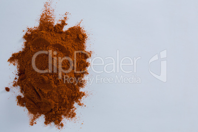 Cinnamon powder on white background