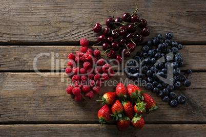 Various fruits on wooden table