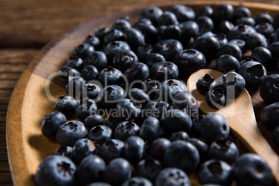 Blueberries in wooden plate