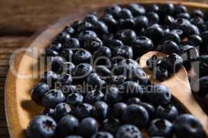 Blueberries in wooden plate