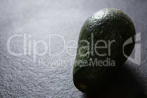 Avocado on wooden table