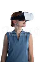 Young businesswoman wearing virtual reality glasses