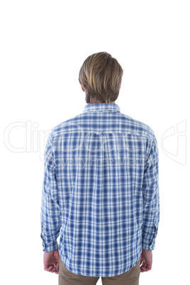 Rear view of businessman with brown hair standing
