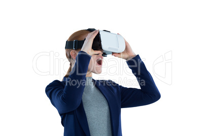Surprised young businesswoman wearing vr glasses