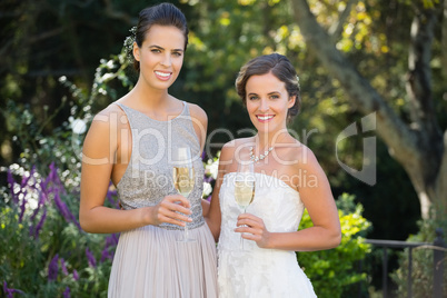 Portrait of bride and bridesmaid in wedding ceremony