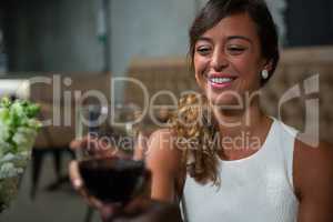 Beautiful woman having red wine