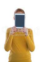 Businesswoman holding digital tablet in front of face
