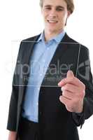 Businessman looking at transparent glass interface