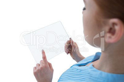 High angle view of young businesswoman using transparent glass interface
