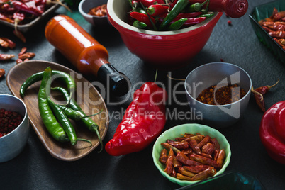 Various spices arranged on black background