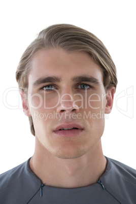 Portrait of young businessman against white background