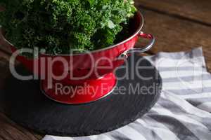 Mustard greens in strainer