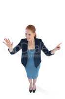 Full length of smiling businesswoman using imaginary interface