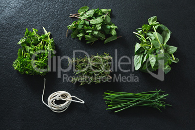 Various type of herbs and rope