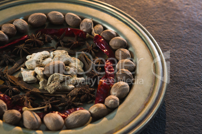 Nutmeg and star anise in plate