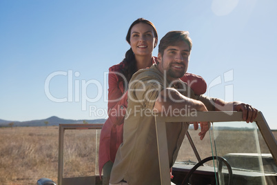 Portrait of couple in off road vehicle