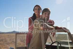 Portrait of couple in off road vehicle