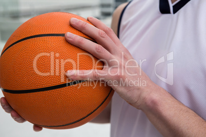 Player holding basketball