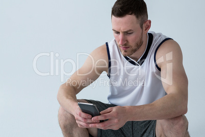 Player using mobile phone