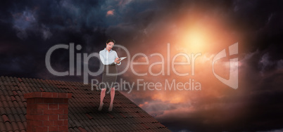 Composite image of elegant young businesswoman with clipboard