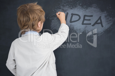 Composite image of cute pupil writing on board
