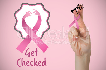 Composite image of cropped hand of woman with pnik breast cancer awareness ribbon