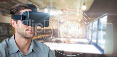Composite image of close up of businessman looking though virtual reality simulator