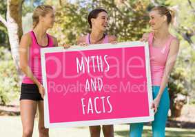 Myths and facts text and pink breast cancer awareness women holding card