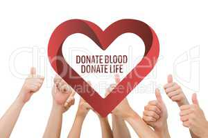 Hands with donate blood donate life text and a heart graphic