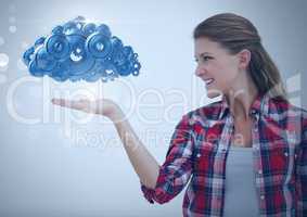 Woman with open hand and cog gears cloud