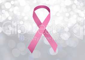 pink ribbon for breast cancer awareness over bright background