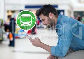 Man holding phone with bus icon