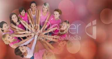 Breast cancer awareness women putting hands together