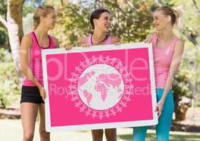 World planet graphic and pink breast cancer awareness women holding card
