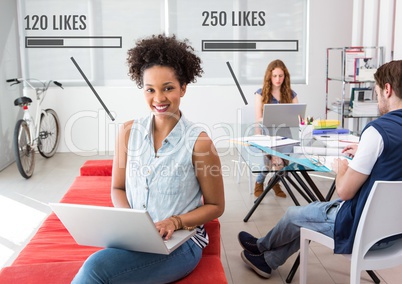 People working in office on computers with Likes status bars