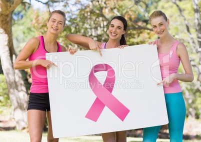 Pink ribbon and pink breast cancer awareness women holding card