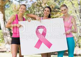 Pink ribbon and pink breast cancer awareness women holding card