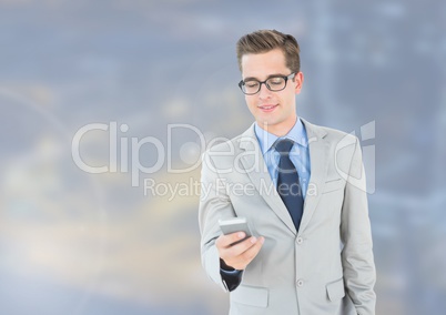 Man holding phone in city