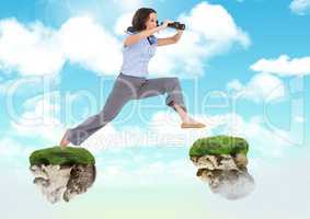 Businessman with binoculars jumping between floating rock platforms in sky